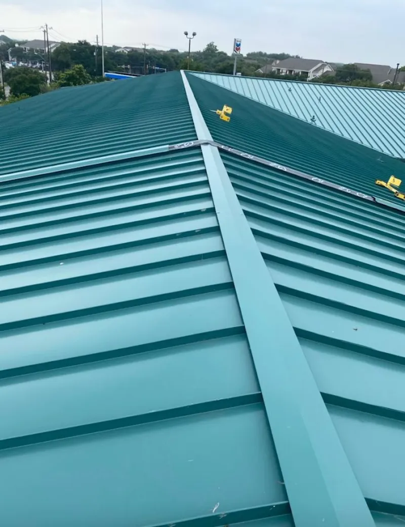 Green commercial metal roof ridge and valley for Metal Roof Repair in Fort Scott