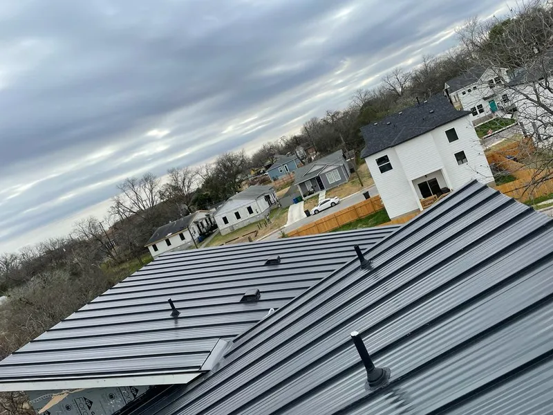 Standing seam metal roof panels with vents for Skylight Repair in Fort Scott
